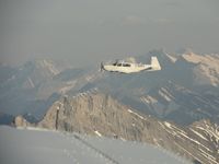 C-GDEV @ CAA8 - C-GDEV over Canadian Rockies - by Devon Matsalla