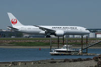 JA827J @ KBOS - Arriving runway 4R - by Rich Barnett
