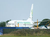 D-AGEG @ EGBP - Germania B737 in the scrapping area at Kemble - by Chris Hall