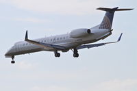 N12136 @ KORD - ExpressJet/United Express Embraer EMB-145XR, ASQ6171 arriving from St. Louis/KSTL, RWY 28 approach KORD. - by Mark Kalfas