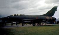 GT-976 @ EGWZ - TF-100F Super Sabre of the Royal Danish Air Force's Eskradille 727 on display at the 1975 RAF Alconbury Airshow. - by Peter Nicholson