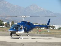 N8NF @ POC - Shutting down parked at PPD helipad - by Helicopterfriend