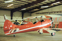 N226E @ SRQ - Waco UPF-7 seen hangered at Sarasota in November 1979. - by Peter Nicholson