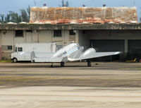 N749T @ TJSJ - An elderly twin Beech soldiers on for Seven Stars Air Cargo at San Juan, PR. - by Daniel L. Berek