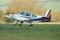 G-BIBT @ EGFP - Resident Tiger departing Pembrey Airport. - by Roger Winser