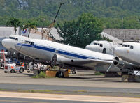 N783T @ TJSJ - Accompanied by unemployed Four Star Cargo DC-3s and bereft of engines, this poor Skytrain (built 1941) won't be going anywhere but will be missed by spotters and propliner enthusiasts throughout the Caribbean. - by Daniel L. Berek