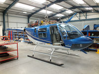 G-BSBW @ EGBS - inside the Tiger Helicopter's Hangar at Shobdon Airfield, Herefordshire - by Chris Hall