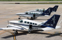 N83PB @ TJSJ - A Cape Air Cessna 402C heads a line-up of sisterships at San Juan. - by Daniel L. Berek