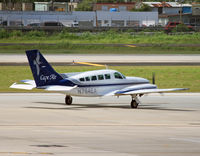 N764EA @ TJSJ - A Cape Air Cessna 402C taxies out at San Juan, off on another brief and scenic flight. - by Daniel L. Berek