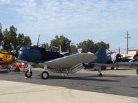 N670AM - 1993 Douglas/Maloney SBD-5 DAUNTLESS dive bomber, Wright R-1820 Cyclone  9 cylinder radial 1,200 Hp, dive brakes deployed - by Doug Robertson