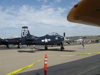 N212DP @ CMA - 1949 North American T-28A TROJAN 'CHECKMATE', Wright R-1300 800 Hp, in Navy blue, unusual as USN rejected A model for higher horsepower & other changes in the -B, -C models. - by Doug Robertson