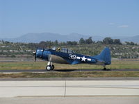 N670AM @ CMA - 1993 Douglas/Maloney SBD-5 DAUNTLESS dive bomber, Wright R-1820 Cyclone 9 cylinder radial 1,200 Hp, taxi to 26, a real rarity among extant warbirds - by Doug Robertson