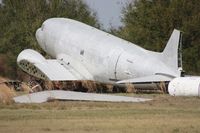 N130D @ F13 - Douglas C-47 missing wings after Hurricane Charley back in 2004 - by Florida Metal