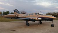 N8150Q @ KAXN - Cessna 414 Chancellor on the ramp. Awesome paint job on this one.