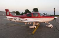 N220PK @ KAXN - Cirrus SR22T on the line. Notice the owl on the prop to scare birds off. - by Kreg Anderson