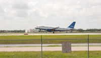 N516JB @ RSW - Jet Blue A320 - by Mauricio Morro