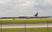 N440US @ RSW - US Airways landing at RSW - by Mauricio Morro