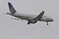 N468UA @ KORD - United Airlines Airbus A320-232, UAL566 arriving from KIAH, RWY 10 approach KORD. - by Mark Kalfas