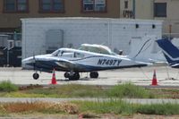 N7497Y @ KFUL - Parked on the south side