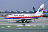 N9061U @ KORD - United's N9061U taxiing at ORD in Feb. 1996. - by John Meneely