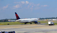 N394DL @ KATL - Towed ATL - by Ronald Barker