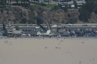 N331C @ KSMO - Towing along Santa Monica Beach - by Nick Taylor