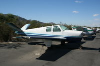 N5228C @ SZP - Parked along the river - by N.A. Taylor