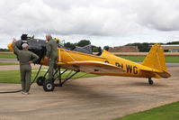 G-RLWG @ EGBR - Ryan ST3KR at the fuel pump. The Real Aeroplane Club's Wings & Wheels weekend, Breighton Airfield, September 2012. - by Malcolm Clarke