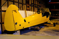 G-ARAM @ EGBK - Piper Cub inside one of the hangars at Sywell - by Chris Hall