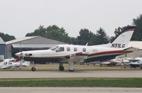 N51LG @ KOSH - Socata TBM 850 - by Mark Pasqualino