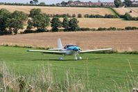 G-BWRO @ X5FB - Harvest in progress in the surrounding fields as a Europa takes off from 26 at Fishburn Airfield UK , September 2012. - by Malcolm Clarke