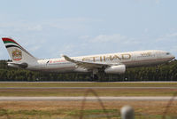 A6-EYJ @ YBBN - Etihad Airbus A330 - by Thomas Ranner