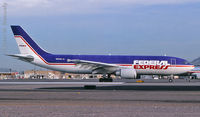 N651FE @ KPHX - Jan. 1997 - about to depart from PHX - by John Meneely
