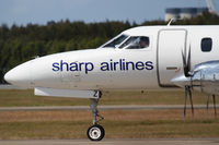 VH-SEZ @ YBBN - Sharp Airlines Fairchild (Swearingen) SA-227 Metro III - by Thomas Ranner