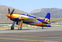 N777L @ RTS - Stewart Dawson piloting psychedelic F8F-2 RARE BEAR #77 after qualifying run @ on September 11, 2012 at Stead Airport during Reno Air Races