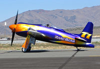 N777L @ RTS - Stewart Dawson piloting psychedelic F8F-2 RARE BEAR #77 after qualifying run @ on September 11, 2012 at Stead Airport during Reno Air Races