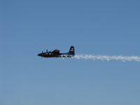 N909TC @ CMA - 1945 Grumman F7F-3P TIGERCAT, two P&W R2800-34 Double Wasps 2.100 Hp each, overflight 26 with airshow  smoke - by Doug Robertson