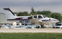 N6748Y @ KOSH - Beech B55 - by Mark Pasqualino