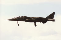 XX841 @ EGQS - Jaguar T.2A, callsign Blackcat 3, of 6 Squadron at RAF Coltishall on final approach to Runway 23 at RAF Lossiemouth in the Summer of 1995. - by Peter Nicholson