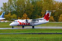 C-GOND @ CYOW - Starting it's takeoff roll on a wet morning. - by Dirk Fierens