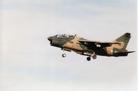 5548 @ EGQS - Portuguese Air Force TA-7P Corsair II on final approach to Runway 23 at RAF Lossiemouth in September 1993. - by Peter Nicholson