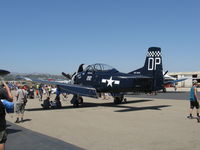 N212DP @ CMA - 1949 North American T-28A TROJAN 'Checkmate', Wright R-1300 800 Hp, in Navy blue, unusual as USN rejected A model for higher horsepower & other changes in the -B, -C models. - by Doug Robertson