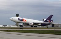 N389FE @ KMKE - MD-10-10F