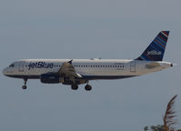 N583JB @ AUA - Landing on Reina Beatrix Airport Aruba - by Willem Göebel