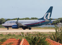 N318AT @ AUA - Take off from Reina Beatrix Airport Aruba - by Willem Göebel