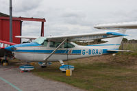 G-BGAJ @ EGJA - Parked up close between other aircraft and against a fence - by alanh