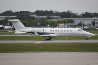 N927SK @ KSRQ - Learjet 45 (N927SK) taxis at Sarasota-Bradenton International Airport - by jwdonten