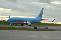 G-FDZO @ EGCC - G-FDZO Thomson Boeing 737-8K5 taxiing Manchester Airport. - by David Burrell