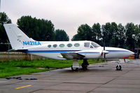 N421EA @ EHRD - Cessna 421C Golden Eagle [421C-1079] Rotterdam~PH 10/09/2003 - by Ray Barber