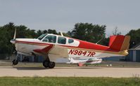 N9847R @ KOSH - Beech M35 - by Mark Pasqualino